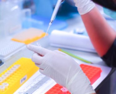 istockphoto-1578646816-612×612 A molecular scientist is manipulating and analyzing samples to perform sequencing on that living sample on Science's Day. A technician is preparing samples with a micropipette.